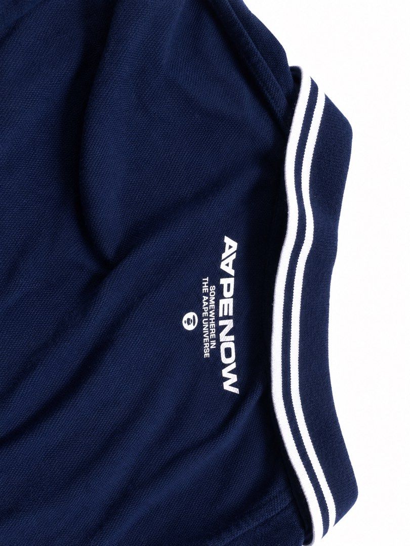 AapeNow navy poloshirt (Category: Tshirts & Polo Shirts ) located in Tagum. Submitted by clent.josh (Listing ID 1467534169, Image 2). Description: issue faded collar.