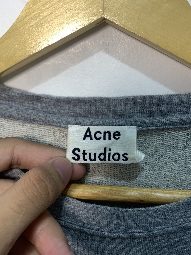 Acne Studios Grey Banana Embroidered Sweatshirt (Category: Longsleeves) located in Davao. Submitted by legitseller1111 (Listing ID 1467469368, Image 3). Description: - Brand: Acne Studios - Color: Grey - Material: Heavyweight cotton - Design: 3D embroidered banana graphic with subtle branding - Fit: Classic crewneck with long sleeves - Condition: Clean interior label intact, solid everyday wear -No issue/s -Excellent condition .
