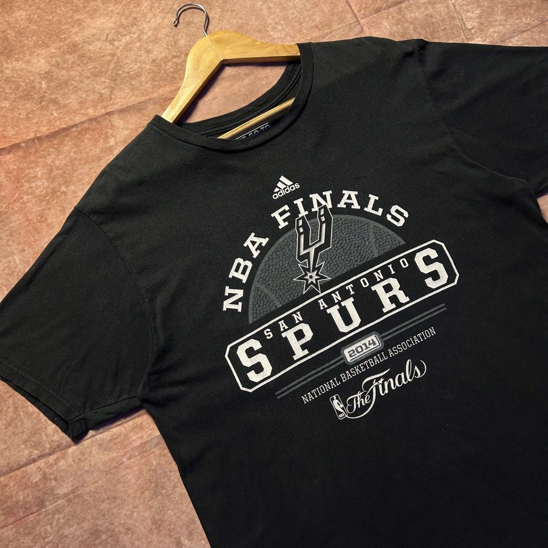 ADIDAS 2014 NBA THE FINALS SPURS TEE (Category: Activewear) located in Dasmarinas. Submitted by 2slickdeals_ (Listing ID 1467411786, Image 2). Description: SIZE XXL 25 WIDTH 31 LENGTH VERY GOOD CONDITION ISSUE: MINOR CRACK PRINT, 2 PIN HOLES. COLOR RATE: 9 / 10 J&T / LALAMOVE / MEET UPS!.