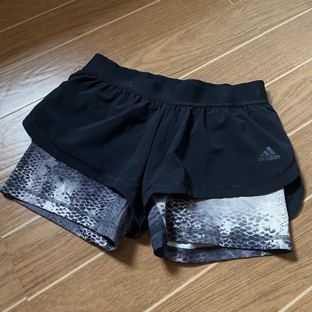 Adidas 2 in 1 short (Category: Activewear) located in Paete. Submitted by fat.archives (Listing ID 1467513611, Image 1). Description: Dimes Waist 28 to 30 Length inner 12 ,outer 7 +sf.