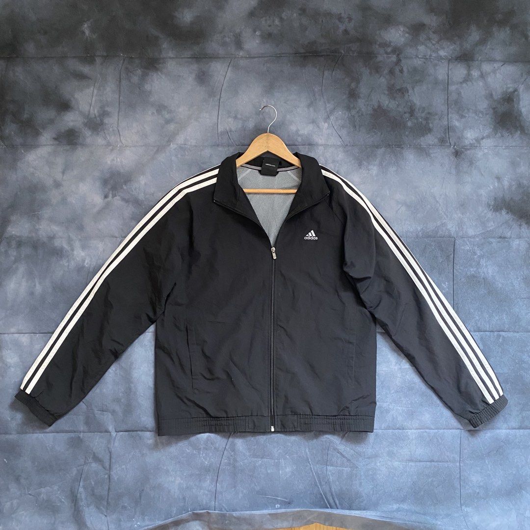 Adidas Clima365 Performance Essentials Black White Track Jacket XL (Category: Coats, Jackets and Outerwear) located in Manila. Submitted by seramisu (Listing ID 1467572897, Image 1). Description: - Brand: Adidas - Style: Classic track jacket with white sleeves stripes - Color: Black with white details - Size: XL (Relaxed fit) - Features: Full zip, stand-up collar, breathable mesh lining, embroidered chest logo - Condition: Great sporty layer for 