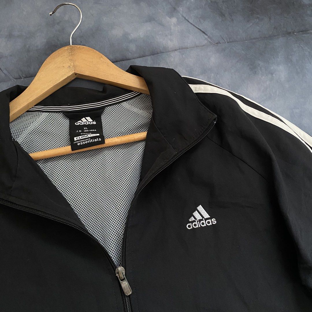 Adidas Clima365 Performance Essentials Black White Track Jacket XL (Category: Coats, Jackets and Outerwear) located in Manila. Submitted by seramisu (Listing ID 1467572897, Image 2). Description: - Brand: Adidas - Style: Classic track jacket with white sleeves stripes - Color: Black with white details - Size: XL (Relaxed fit) - Features: Full zip, stand-up collar, breathable mesh lining, embroidered chest logo - Condition: Great sporty layer for 