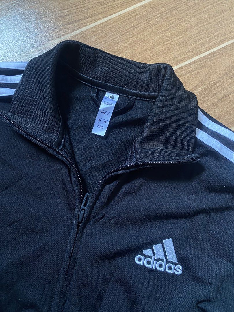 Adidas Essentials Warm-Up 3-Stripes Track Jacket (Category: Activewear) located in Paete. Submitted by fat.archives (Listing ID 1467514133, Image 2). Description: Dimes Bust 20 Length 26 +sf.