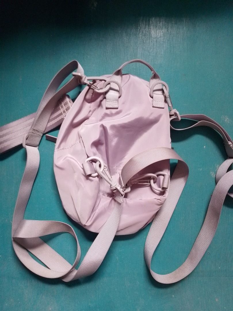 Adidas Original Pastel Purple Mini Backpack (Category: Backpacks) located in Caloocan City. Submitted by hmm_shop83 (Listing ID 1467441810, Image 2). Description: - Brand: Adidas - Color: Lilac Purple - Design: Classic trefoil logo with branded zip pull tabs - Features: Adjustable straps and secure zip closure - Origin: Made in Vietnam (RN 88387 CA 40312) - Condition: Compact size, perfect for daily commutes and casual outings.