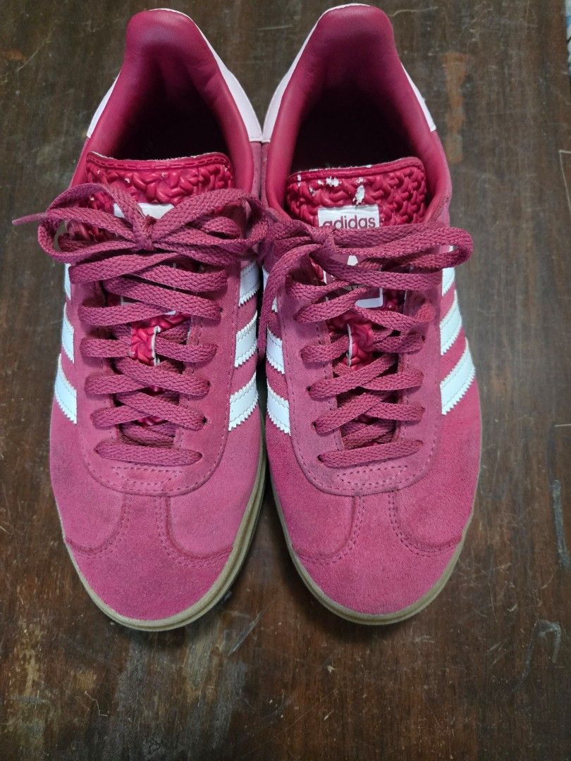 Adidas Pink Suede Platform Sneakers (Category: Sneakers) located in Manila. Submitted by fanfanny01 (Listing ID 1467372973, Image 1). Description: - Brand: Adidas - Style: Pink suede sneakers with iconic white stripes - Soles: Gum platform with a distinct circle pattern underneath - Details: Dark pink laces, matching inner lining, and woven texture on the tongues - Condition: Great daily trainers with some minor wear on the tongue label - Aesthet