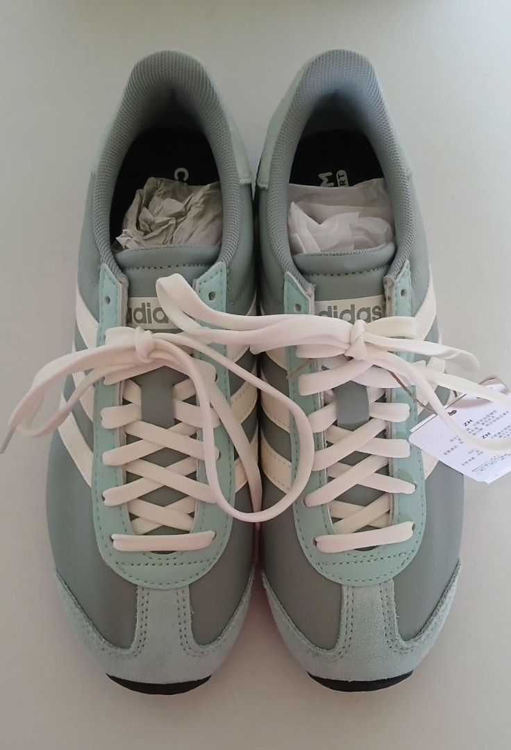 Adidas Shoes (Category: Sneakers) located in Batangas. Submitted by thriftshop_izy15 (Listing ID 1460791778, Image 3). Description: - Authentic - Sage green Adidas sneakers - Features iconic white stripes - Classic lace-up closure - Retro design, ideal for casual outings - Size: US 6, F 37 1/3, UK 4 1/2.