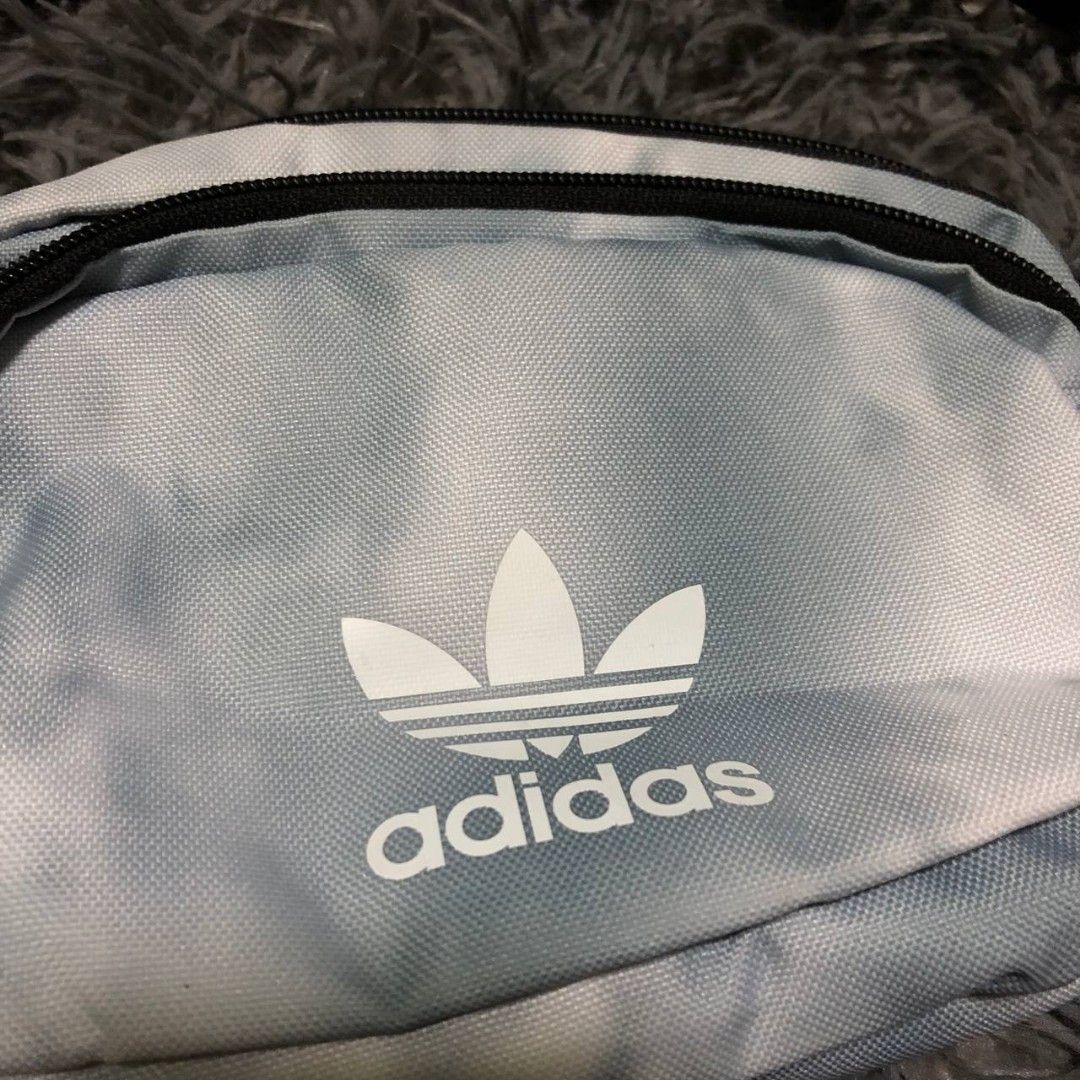 Adidas Sling bag (Category: Sling Bags) located in Camiling. Submitted by thriftscape2024 (Listing ID 1467498336, Image 2). Description: Excellent Condition Color rate: 9/10 Issue: ❌❌❌.