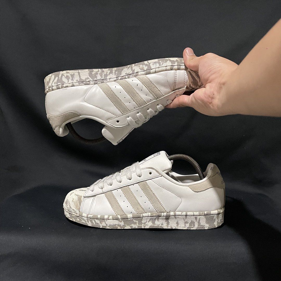 Adidas Superstar Marble White Size US 8.5 (Category: Sneakers) located in Bulacan. Submitted by ogieeee (Listing ID 1467447066, Image 3). Description: - Brand/Model: Adidas Superstar - Colorway: White and Grey with Unique Marble Design - Size: US 8.5 / EUR 42 / CM 26.5 - Materials: Leather upper with suede stripes and marble-printed shell toe and outsole - Condition: Preloved, clean overall look with mild wear on tags and soles - Status: Ready to