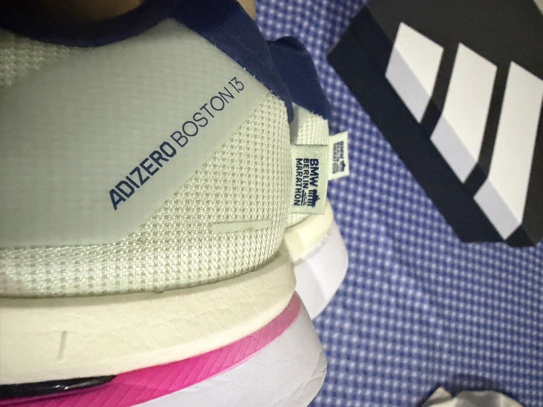 Adizero Boston 13 Berlin Marathon edition (Category: Sneakers) located in Mandaluyong City. Submitted by iynniynn (Listing ID 1467585773, Image 2). Description: php. 5999 US 8.5 men US 10 women Used 6-7x only indoor No foul odor No sole sep No heal drag Adidas Adizero Boston 13 BMW Berlin Marathon Edition in pink (officially styled as Linen Green / Shock Pink / Dark Blue) is a neutral running shoe built for high-speed training and marathon distan