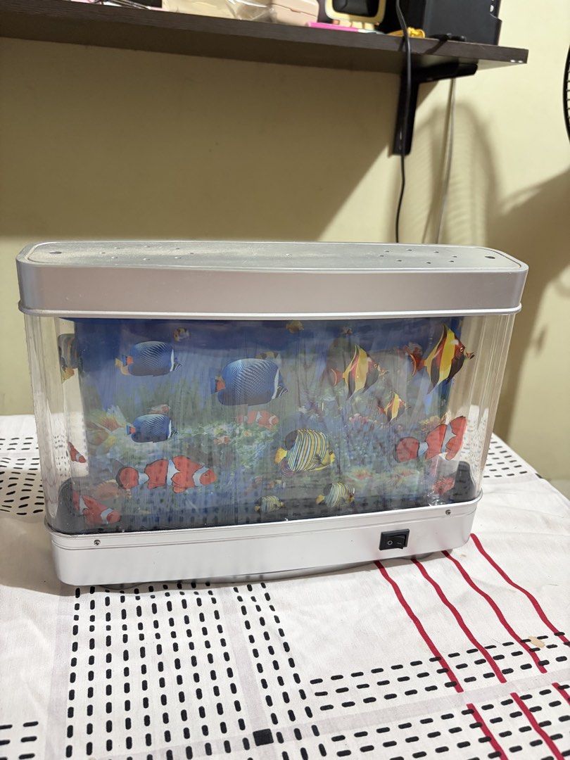 aesthetic fish lamp (Category: Other Home Decor) located in Marikina City. Submitted by kyrabns (Listing ID 1467532255, Image 1). Description: • good condition & negotiable • aesthetic decor for study table or room • light is bright and perfect as a night light • can send a video via pm! 📍marikina city.
