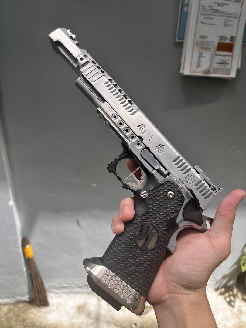 Airsoft pistol (Category: Action & Battle Toys) located in Manila. Submitted by someoneanyone (Listing ID 1467389973, Image 1). Description: No issue 380 FPS Hi capa Quite accurate AW custom hx2402 Wind velocity Everything working No leakage No broken parts Unli testing.