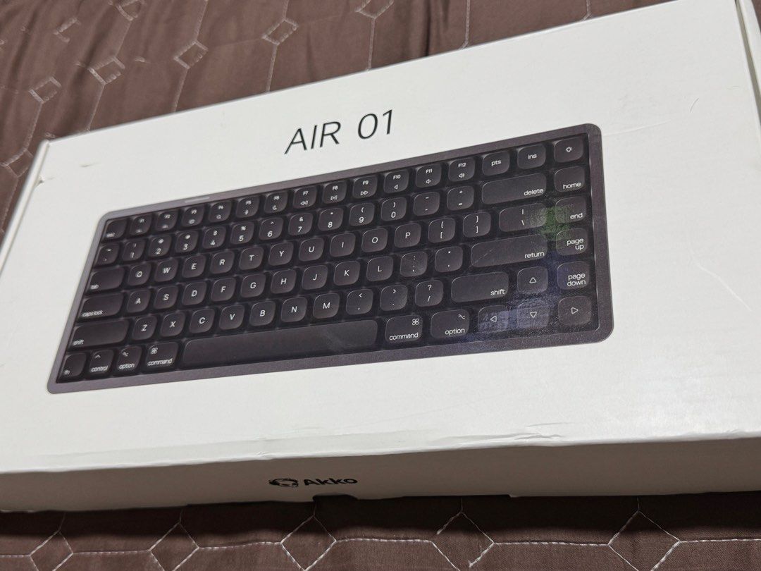 Akko Air 01 Wireless Keyboard (Category: Computer Keyboard) located in Taguig. Submitted by nero.025 (Listing ID 1467373031, Image 1). Description: Compatible with Windows/Mac 75% layout RGB Backlit Hot-Swappable 4500 mAh Purchased: 05/28/2026 With PixelPlay Receipt RFS: Decluttering (got multiple keyboards) Original Price: 4,395 Selling Price: 3,700 Location: Taguig City Shipping: Buyer handles via Lalamove.