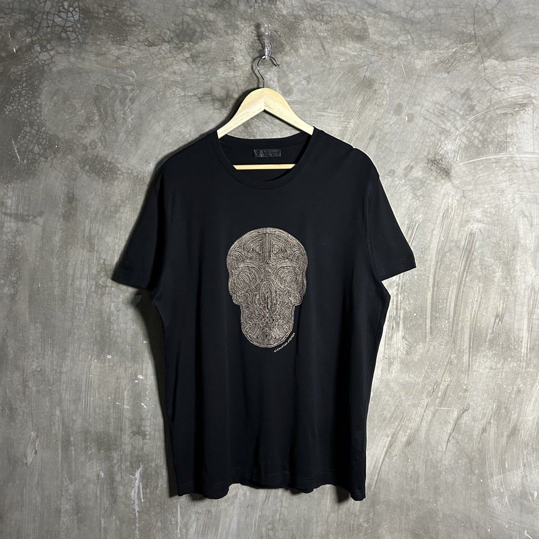 Alexander Mcqueen - Textured Skull Black Tee (Category: Luxury Apparel) located in Tayabas. Submitted by streetdepartment (Listing ID 1467546334, Image 1). Description: Alexander Mcqueen - Textured Skull Black Tee Excellent condition Flaw/s: minor loose stitch on neckline and needswash Size: XXL fits XL Measurements (inches): Width: 23” Length: 30” Dm to purchase! Note: Manage your expectations as you are dealing with secondhand items. Color may 