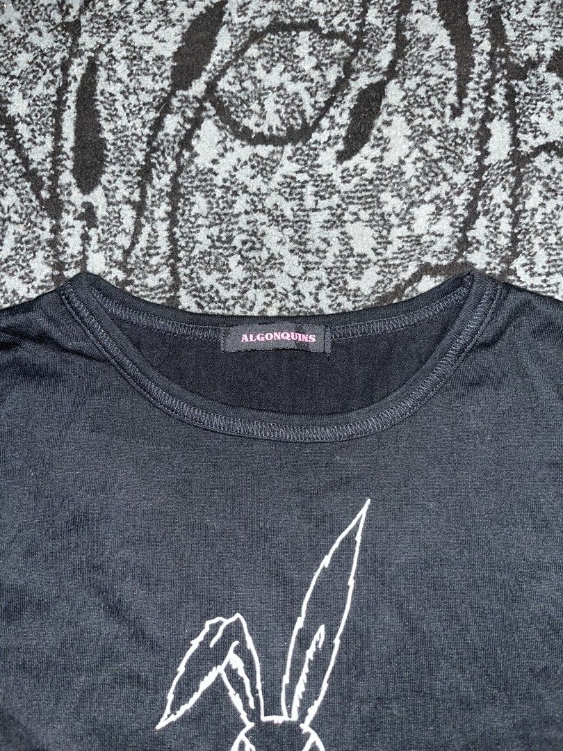 Algonquins Graphic Tee Rabbit Skeleton (Category: Tshirts & Polo Shirts ) located in Manila. Submitted by kashjulliane (Listing ID 1467366615, Image 2). Description: - Brand: Algonquins (Classic Japanese Punk Goth Street Fashion) - Color: Black - Size: Large - Material: Soft, comfortable cotton - Design: Bold front graphic of a bunny skull tied up with 'FUCK!!' and 'ALGONQUINS' banner tapes - Details: Classic crew neck, short sleeves with unique 