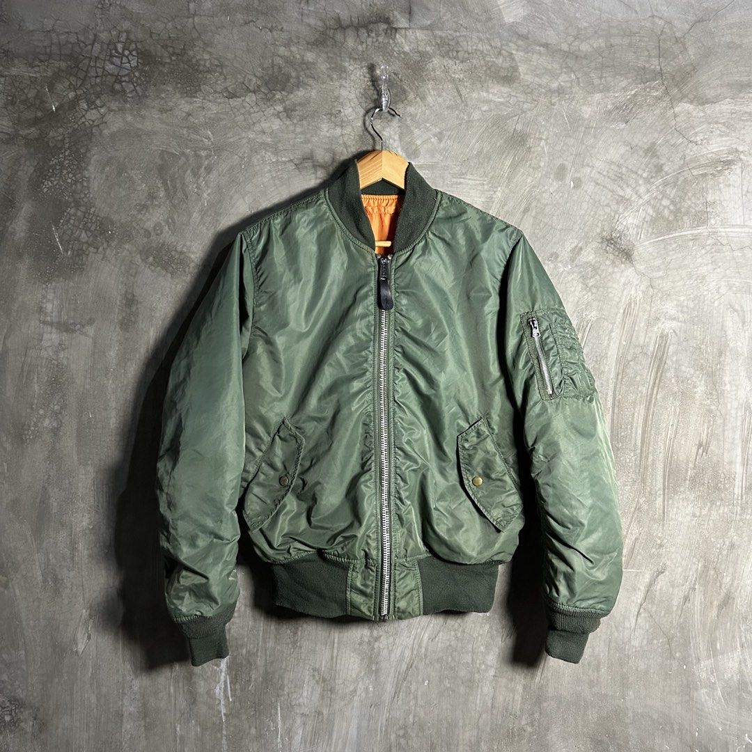 Alpha Industries - MA-1 Flight Reversible Bomber Jacket (Category: Coats, Jackets and Outerwear) located in Tayabas. Submitted by streetdepartment (Listing ID 1467547595, Image 1). Description: Alpha Industries - MA-1 Flight Reversible Bomber Jacket Very good condition Flaw/s: minimal stain and sign of used, no major flaws Size: Medium Measurements (inches): Width: 23” Length: 25” Shoulder: 17.5” Sleeves: 25.5” Hem: 15” Dm to purchase! Note: Mana