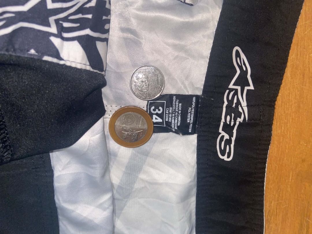 Alpinestars Board Shorts Men Size 34 (Category: Swim Trunks & Board Shorts) located in Sindangan. Submitted by johncyren589837 (Listing ID 1467479723, Image 3). Description: Brand: Alpinestars Size: 34 Color: Black and grey stripes Material: Lightweight fabric ideal for swimming and beach days Features: Drawstring waist with branded hardware, graphic print on leg and back, and a convenient rear zip pocket Pm for more details. Shoot your offer, ne