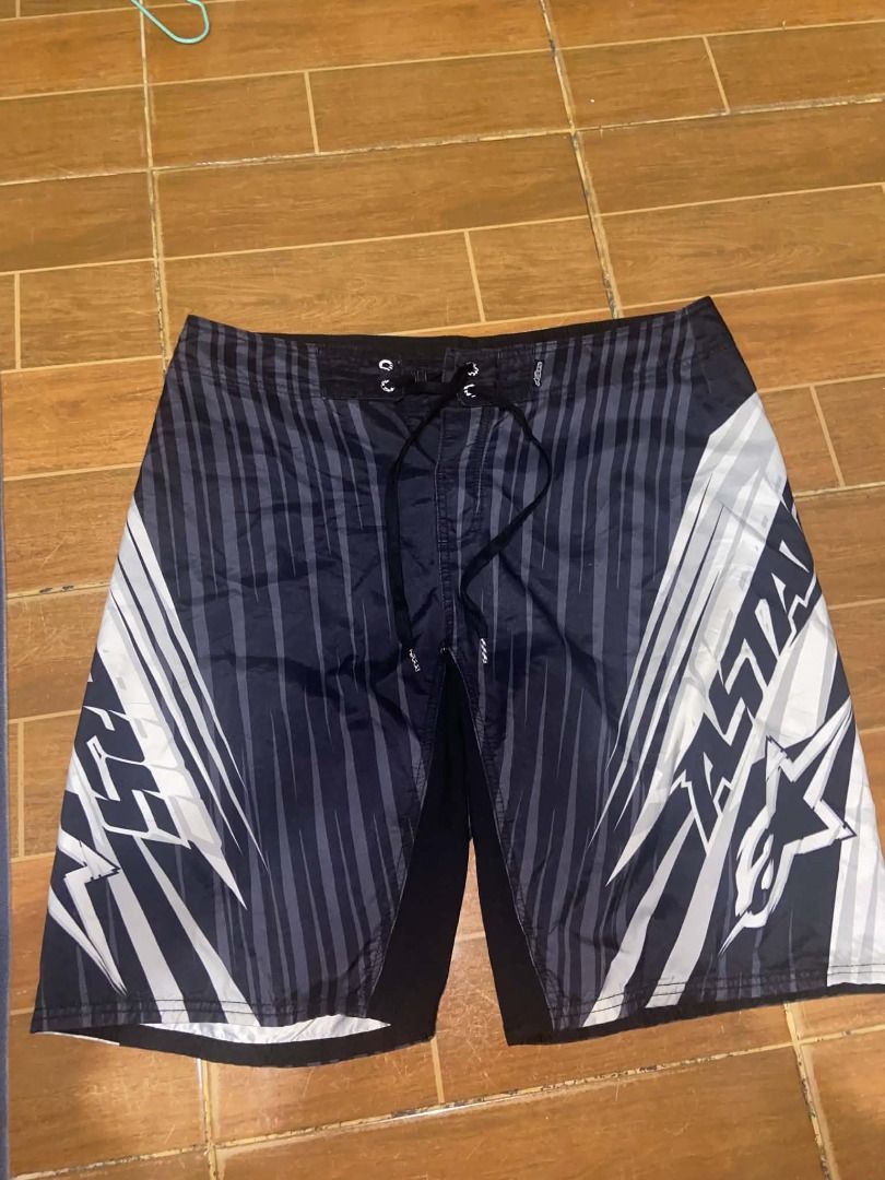 Alpinestars Board Shorts Men Size 34 (Category: Swim Trunks & Board Shorts) located in Sindangan. Submitted by johncyren589837 (Listing ID 1467479723, Image 1). Description: Brand: Alpinestars Size: 34 Color: Black and grey stripes Material: Lightweight fabric ideal for swimming and beach days Features: Drawstring waist with branded hardware, graphic print on leg and back, and a convenient rear zip pocket Pm for more details. Shoot your offer, ne
