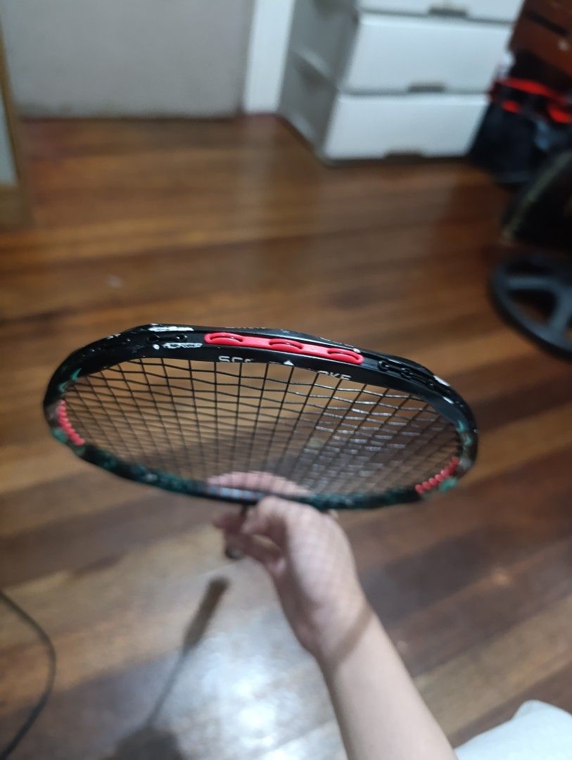 Alp-Sport Badminton Racket (Category: Racket and Ball Sports) located in Manila. Submitted by francissrey (Listing ID 1467474289, Image 1). Description: - Brand: Alp-Sport badminton racket - Color: Sleek black and green with red accent on the bottom cap logo - Condition: Strung and ready for the court; normal cosmetic frame wear from shuttlecock impacts - Grip Size: Standard - Ideal For: Solid recreational play.