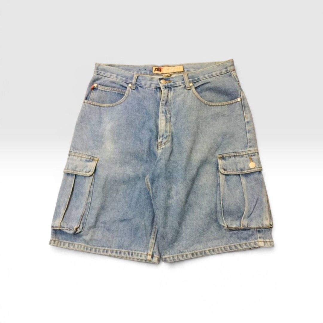 Americana Blues Denim Cargo Shorts (Category: Shorts) located in Manila. Submitted by gentlecloud_713dbd (Listing ID 1467511004, Image 2). Description: - Brand: Americana Blues - Style: Classic 90s streetwear denim cargo shorts - Wash: Light wash - Material: 100% premium cotton - Features: Multiple functional cargo pockets, leather back waistband patch, and branded button closure - Condition: Great quality, ready to wear.