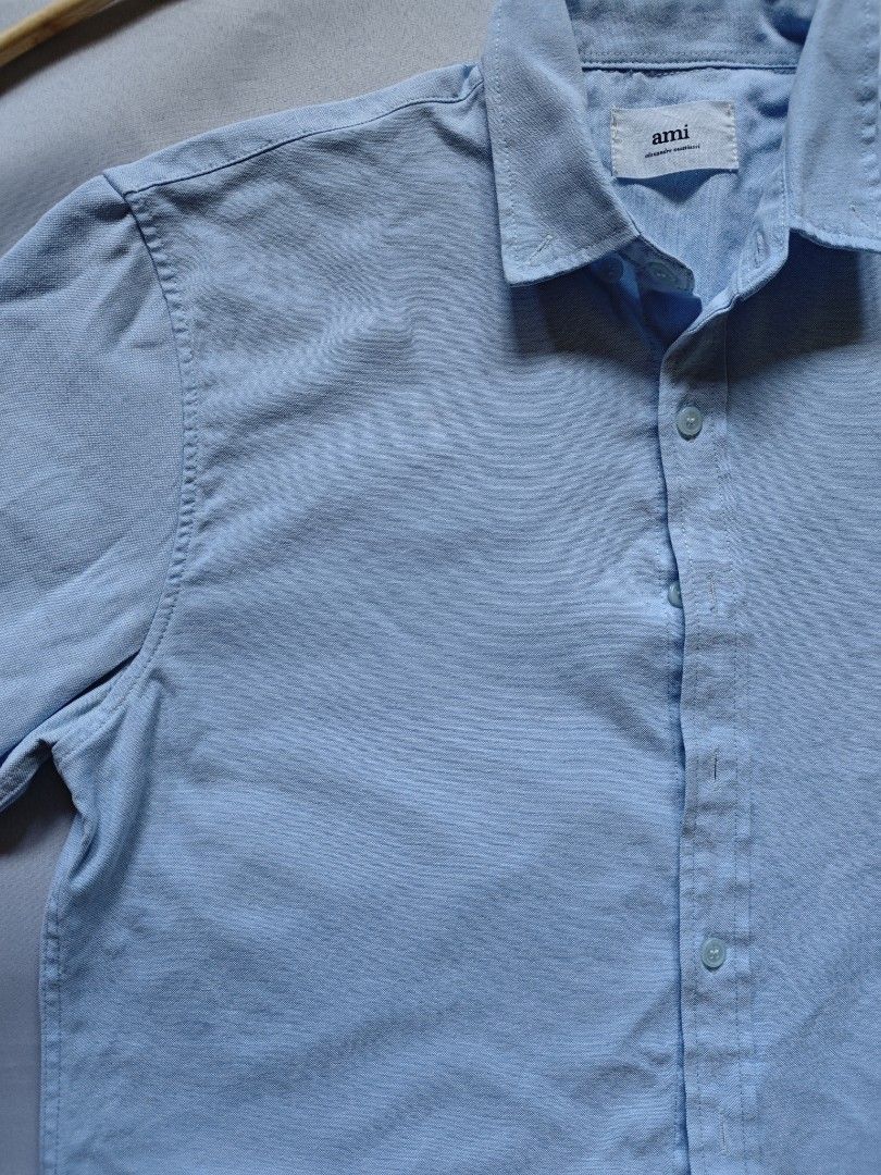Ami Polo (Category: Tshirts & Polo Shirts ) located in Cabuyao City. Submitted by grand_vault (Listing ID 1467416851, Image 2). Description: Size: L Width: 22 Length: 26 Condition: 10/10 Color rate: 10/10 Issue:none.