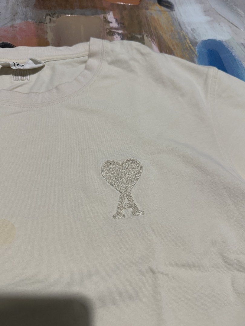 AMI tshirt (Category: Tshirts & Polo Shirts ) located in Las Pinas. Submitted by thrftmnl. (Listing ID 1467421709, Image 2). Description: AMI tshirt Size: Large-XL Width: 23.5 Length: 27 Issue: pinholes and removable stain.