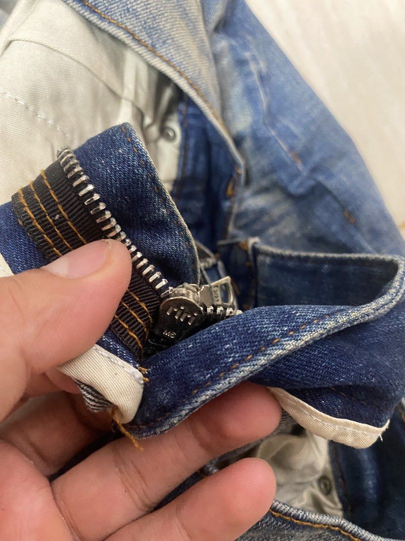 AMIRI Distressed Slim Jeans Size 30 (Category: Jeans) located in Alburquerque. Submitted by zanegavynn43872 (Listing ID 1467363978, Image 3). Description: - Brand: AMIRI - Style: Distressed denim jeans with blue wash - Size: 30 - Details: Distressed knees with ribbed underlays and signature Riri hardware on the fly - Material: 98% cotton, 2% elastane (Made in USA with Italian materials) - Condition: Excellent, with clean interior tags and waist b