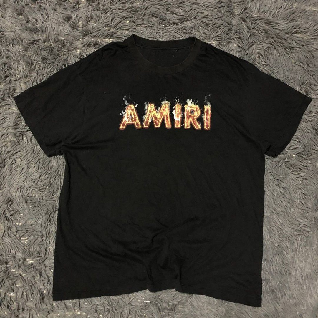 Amiri Shirt (Category: Tshirts & Polo Shirts ) located in Camiling. Submitted by thriftscape2024 (Listing ID 1467471991, Image 1). Description: Excellent Condition Color rate: 9/10 Issue: 3 pinholes sa mismong tag Dimes: W23xL27.