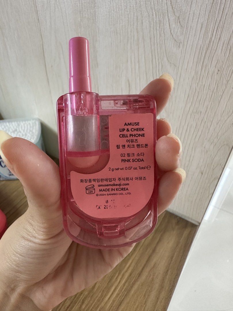Amuse Hello Kitty Lip phone case (Category: Makeup) located in Manila. Submitted by goddessfinds (Listing ID 1467386828, Image 2). Description: used up all of the lipbalm Only the pink lip shades are left See photo Authentic bought from korea.