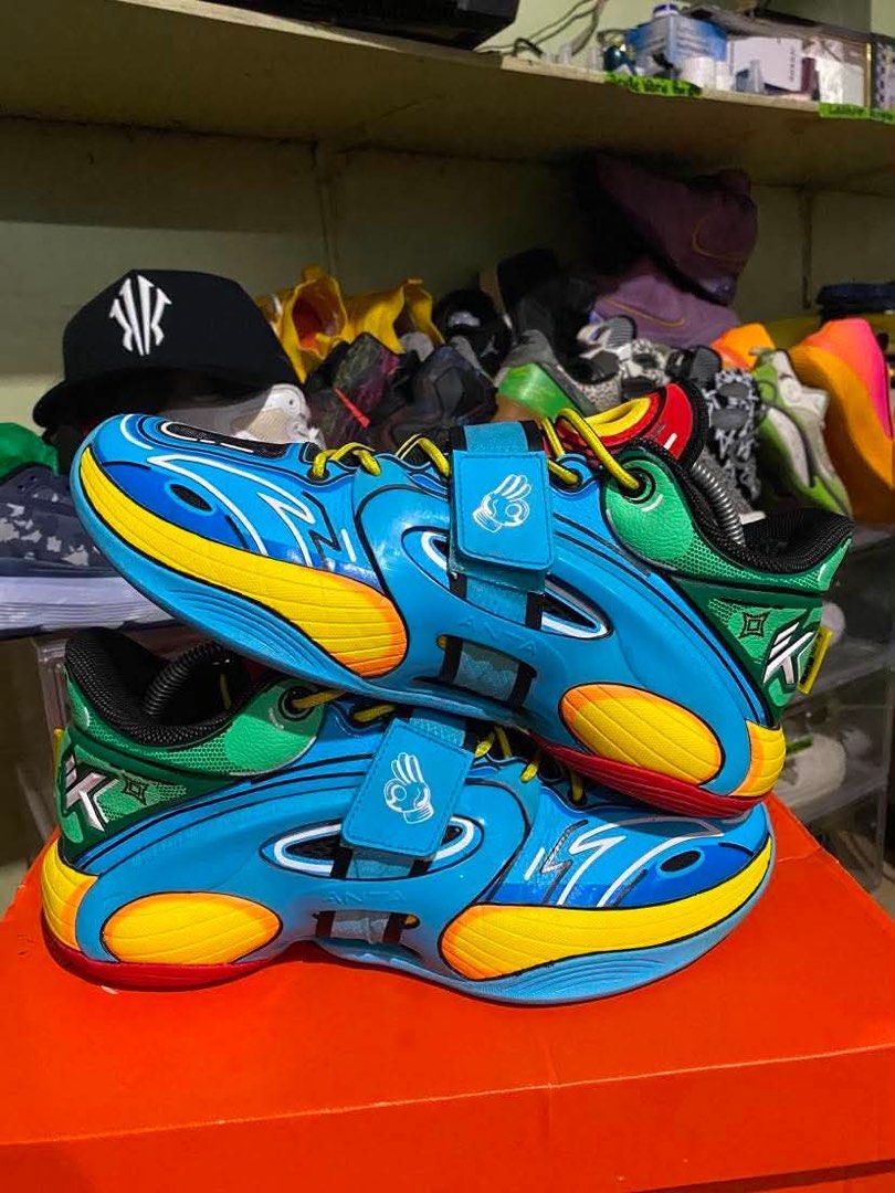 ANTA KT Splash 5 "Nijigen" Size: 9.5 / 43 (Category: Sneakers) located in Manila. Submitted by kimwelljoh77132 (Listing ID 1467428046, Image 1). Description: - Authentic Anta Klay Thompson signature basketball shoes - Eye-catching blue, yellow, and green colorway with unique comic art graphics - Secure midfoot strap for ultimate lockdown and ankle support - Cushioned sole with circular traction pattern for superior court grip - High-top design fe