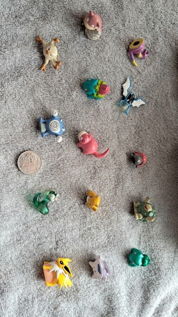 Any 2 for 280 Vintage Pokemon Mini Figures (Category: Figurines & Statues) located in Cavite. Submitted by naning049 (Listing ID 1467498222, Image 2). Description: - Set of 13 classic Pokémon mini figurines - Includes Golbat, Ivysaur, Slowpoke, Mankey, Poliwrath, Jolteon, and others - Features mixed solid plastic and translucent styles - Coin shown in photos for size reference - Ideal starter set for collectors or cute desktop displays.