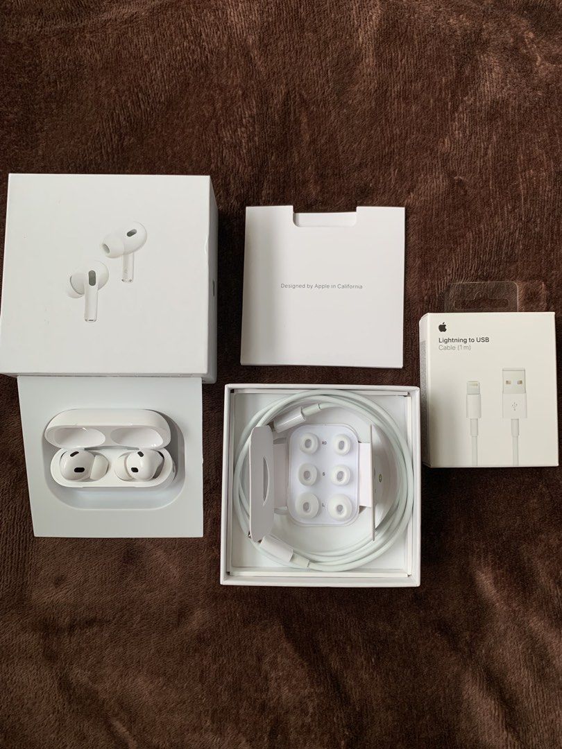 Apple AirPods Pro 2nd Generation with Lightning to USB Cable (Category: Headphones & Headsets) located in Manila. Submitted by mau13 (Listing ID 1467387888, Image 2). Description: - Apple AirPods Pro (2nd Generation) with charging case - Includes original box, documentation, and all extra ear tip sizes - Comes with a separate, brand-new unopened 1m Lightning to USB cable - Perfect for daily commuting, music, and crystal-clear calls.