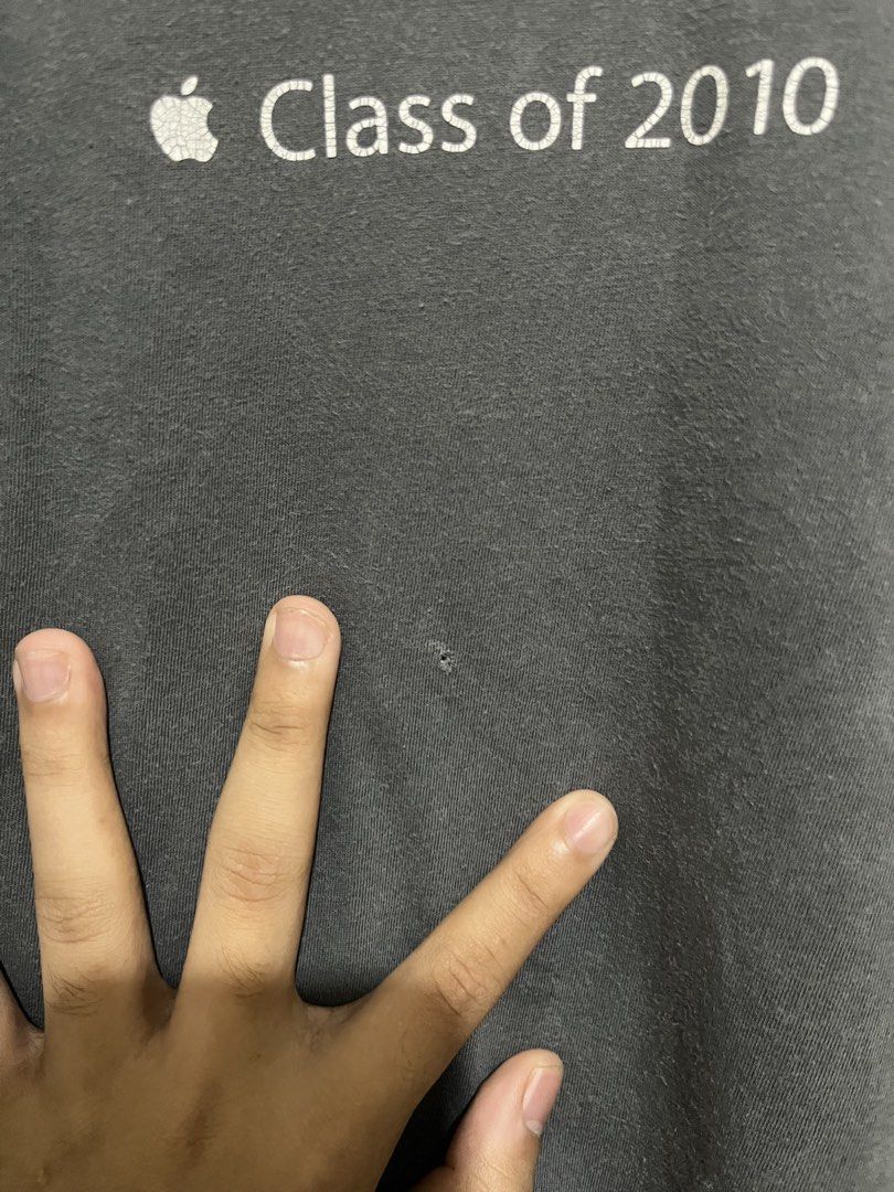 Apple “Class of 2010” Employee Promo Tee (Category: Tshirts & Polo Shirts ) located in Santa Cruz. Submitted by wecareaboutthingswedonothave (Listing ID 1467601419, Image 3). Description: Width - 23 Length - 27 XL on tag Issue: Pinhole. History of repair. See picture Shipping will be shouldered by the buyer.