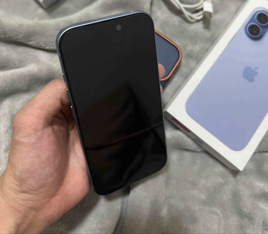 Apple iPhone 17 256GB Blue with Box and Case (Category: iPhone 17 Series) located in Manila. Submitted by brightflower-b3ed (Listing ID 1467578494, Image 2). Description: Apple iPhone 17 in blue, 256GB storage capacity. Includes original box, USB-C charging cable, and a blue protective phone case. Clean screen, dual rear camera setup, side buttons fully intact. Warranty valid until May 2027. 97% battery health.