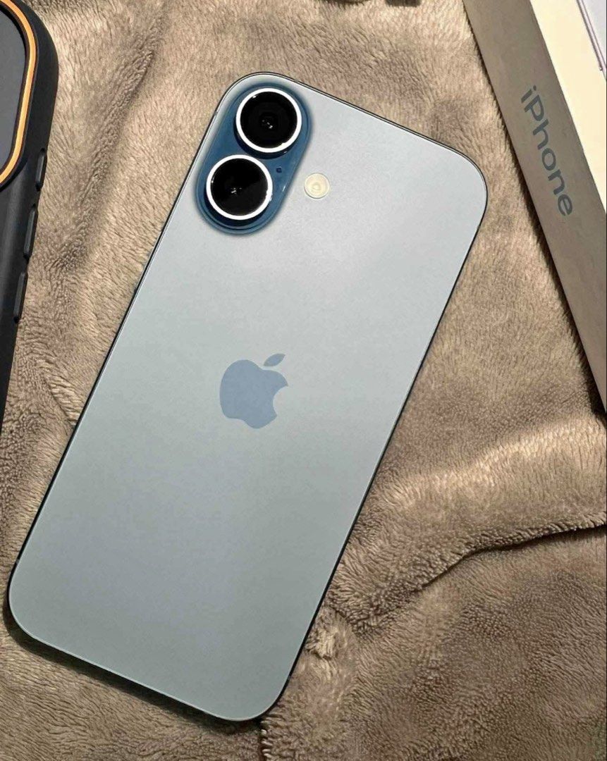 Apple iPhone 17 256GB Blue with Box and Case (Category: iPhone 17 Series) located in Manila. Submitted by brightflower-b3ed (Listing ID 1467578494, Image 1). Description: Apple iPhone 17 in blue, 256GB storage capacity. Includes original box, USB-C charging cable, and a blue protective phone case. Clean screen, dual rear camera setup, side buttons fully intact. Warranty valid until May 2027. 97% battery health.