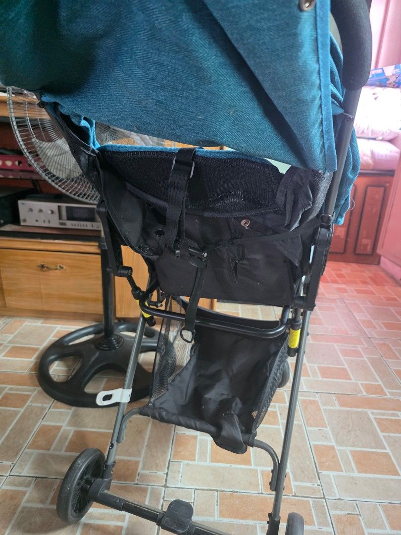 Apruva Blue and black foldable baby stroller with canopy (Category: Strollers) located in Taguig. Submitted by dilyndelro36287 (Listing ID 1467475433, Image 1). Description: - Stylish blue fabric seat with matching canopy - Sturdy black frame with secure safety straps - Convenient storage basket underneath for bags and baby essentials - Compact fold design for easy storage and transport - Comfortable padded push handle for daily walks and trips o