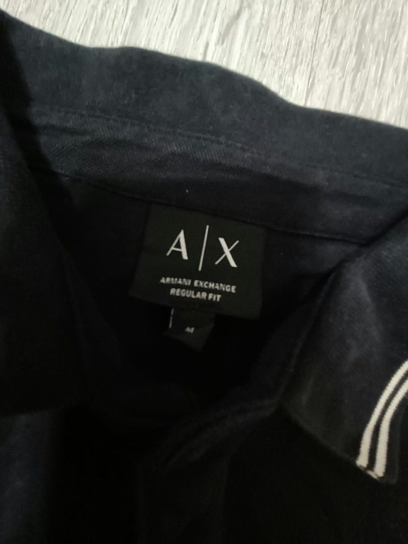 Armani Exchange Polo Shirt (Category: Tshirts & Polo Shirts ) located in Angeles City. Submitted by 2bee_shop (Listing ID 1467385617, Image 3). Description: Armani xchange 22.5/27 🧷 good condition 🧷 embroidered logo 🧷 need wash Mine: 500+sf.
