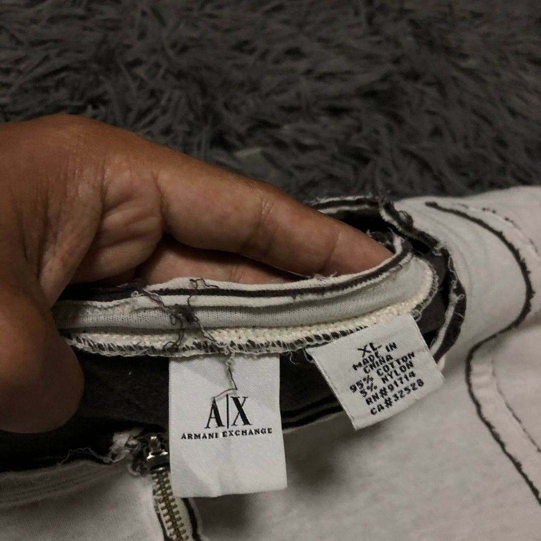 Armani Exchange Qzip (Category: Activewear) located in Camiling. Submitted by thriftscape2024 (Listing ID 1467504973, Image 2). Description: Excellent Condition Color rate: 9/10 Issue: 1 pinhole Dimes: W23xL28.