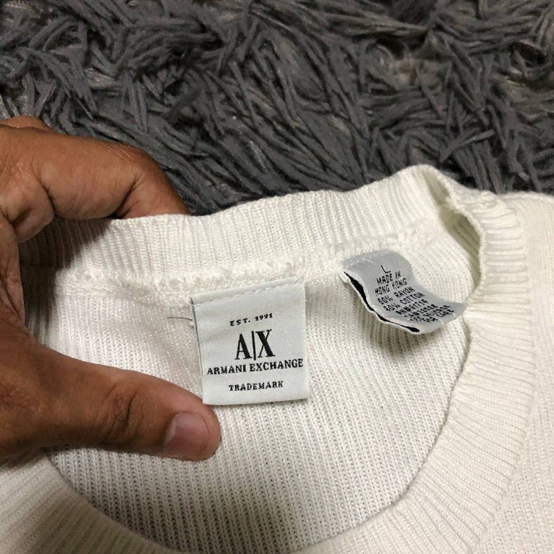 Armani Exchange Sweater (Category: Activewear) located in Camiling. Submitted by thriftscape2024 (Listing ID 1467496270, Image 2). Description: Excellent Condition Color rate: 9/10 Issue: ❌❌❌ Dimes: W20xL27.