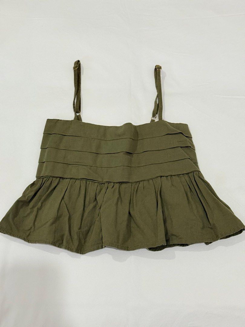 Army Green Tank Top (Category: Sleeveless) located in Pasig City. Submitted by mxvxt (Listing ID 1467446489, Image 1). Description: 〰 in good condition, has adjustable straps 〰 fits XS-S frame 〰 cute & dainty summer european top! 〰 rfs: decluttering .