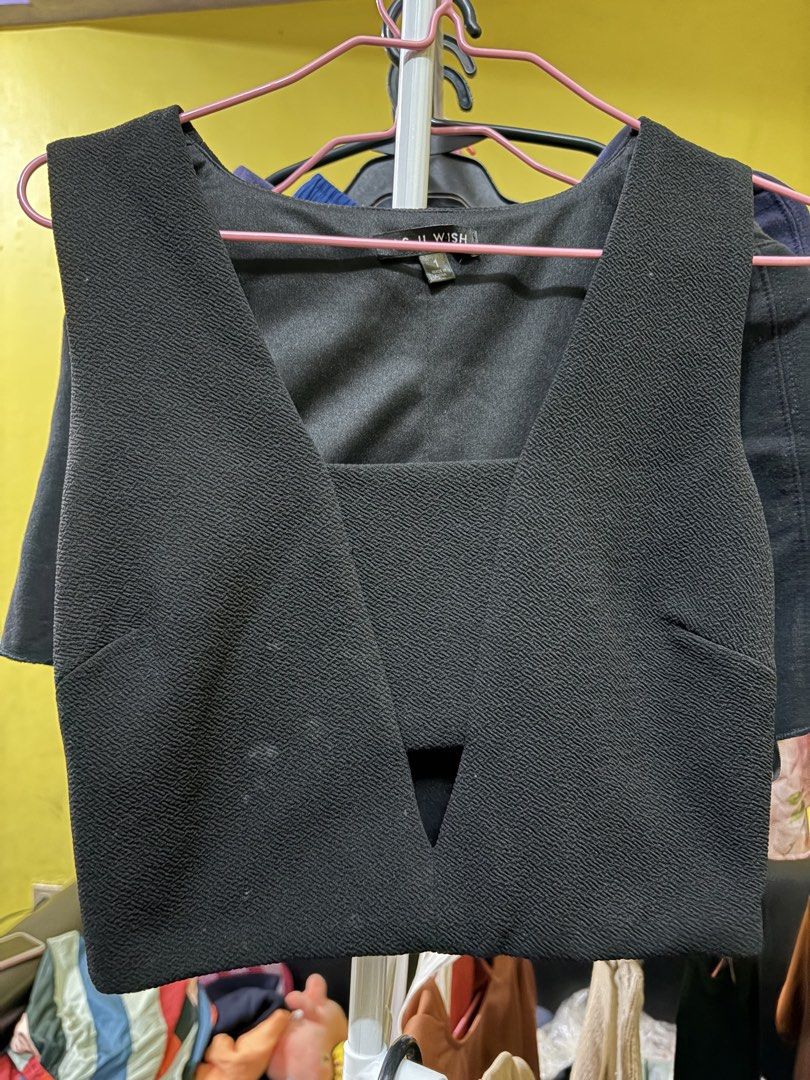 As U Wish Black Sleeveless Crop Top (Category: Sleeveless) located in Calamba. Submitted by handpickedbynetty (Listing ID 1467386059, Image 1). Description: - Brand: As U Wish - Color: Black - Size: 1 - Material: Structured textured fabric - Design: Sleeveless, deep V-cut neckline, stylish front cutout detail - Condition: Preloved, personal piece that no longer fits - Mode of transaction: Shipping or meet-up available (DM for inquiries).