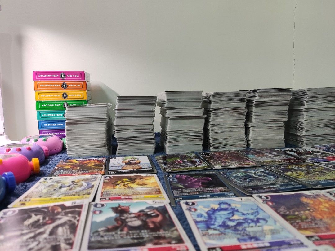 Assorted characters (Category: Raw Singles) located in Paranaque City. Submitted by tamahatchery (Listing ID 1467538462, Image 3). Description: Digimon TCG Bulk Sale C/UC/R Please read: - chinese language - a lot of common dupes (please manage expectations) - bt21 to bt25 (most bt21) - 7 rares - a couple of UC and mostly C - 1800-2000pcs, idk, I placed bicycle cards at the far left to estimate, far left side seems to be like around 250pcs+ cards 