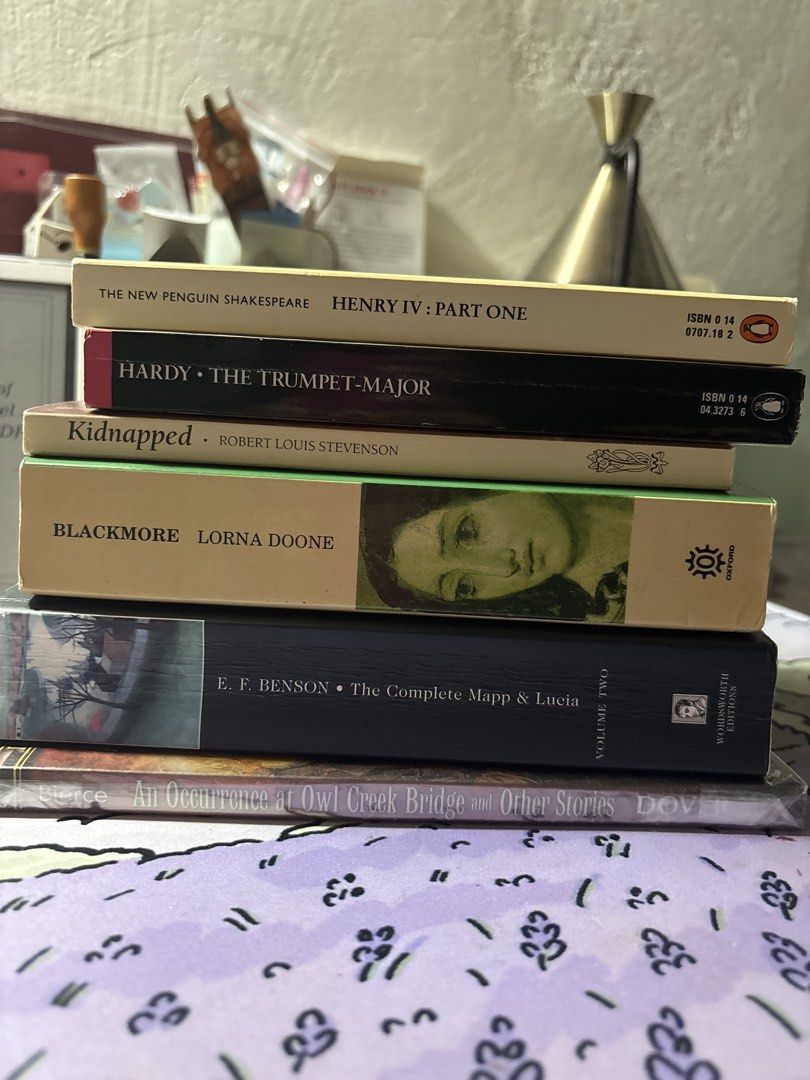Assorted Classic Literature and Fiction Paperback Books Bundle (Category: Storybooks) located in Balanga. Submitted by lindzirmz (Listing ID 1467402927, Image 1). Description: - Set of 6 classic literature paperback books - Includes titles by Shakespeare, Thomas Hardy, Robert Louis Stevenson, R.D. Blackmore, E.F. Benson, and Ambrose Bierce - Features reputable publishers such as Penguin, Oxford, and Wordsworth - Perfect addition to any literature