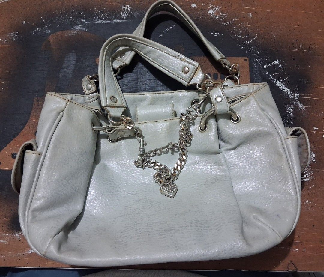 Assorted Women's Bag (Category: Shoulder Bags) located in Caloocan City. Submitted by quicktree.38f79c (Listing ID 1467379779, Image 3). Description: Assorted pre-loved women's bags for sale, featuring brands like Charles Jourdan Paris and Mango Accessories. Various colors and styles including magenta leather, light grey, black, and tan. Great for daily use and outings. Message for details. 1. CharlesJourdan Paris Fuscia Bag 2. MNG Accessories Da