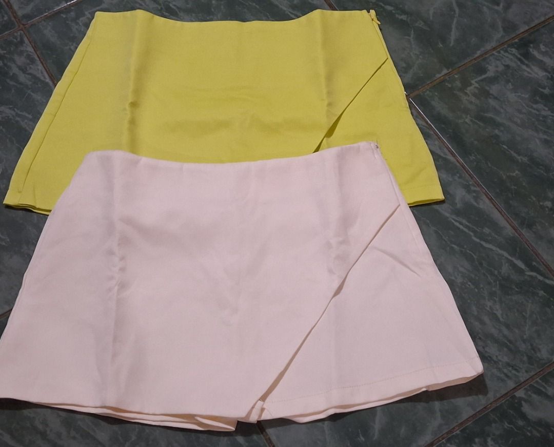 Asymmetric Wrap Skorts Shorts Lime Green (Category: Shorts) located in Manila. Submitted by katkween23 (Listing ID 1467395000, Image 3). Description: - Lime Green) - Fit: High-waisted with a secure side zipper closure - Design: Asymmetric front flap (skirt look in front, shorts in the back) - Material: Smooth, comfortable fabric - Occasion: Ideal for casual outings, dates, or parties - Note: Selling as a set (both colors included).