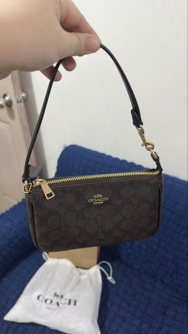 Authentic Coach Nolita 19 (Category: Luxury Bags & Wallets) located in Bulacan. Submitted by clever.chichi28 (Listing ID 1467467578, Image 1). Description: Authentic Coach Nolita 19 Purchased brand new in Hong Kong. Used only once and still in excellent condition. Price: 9500 negotiable Complete inclusions: * Original receipt * Original barcode and care tags * Coach dust bag * Original Coach paper shopping bag Selling because I need funds. PM for