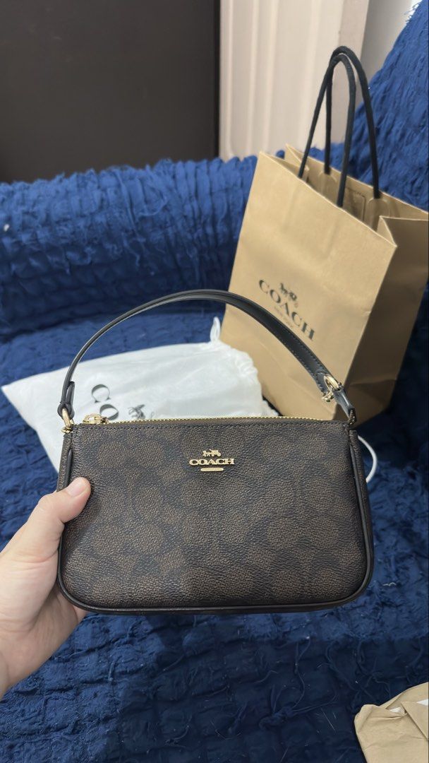 Authentic Coach Nolita 19 (Category: Luxury Bags & Wallets) located in Bulacan. Submitted by clever.chichi28 (Listing ID 1467467578, Image 2). Description: Authentic Coach Nolita 19 Purchased brand new in Hong Kong. Used only once and still in excellent condition. Price: 9500 negotiable Complete inclusions: * Original receipt * Original barcode and care tags * Coach dust bag * Original Coach paper shopping bag Selling because I need funds. PM for