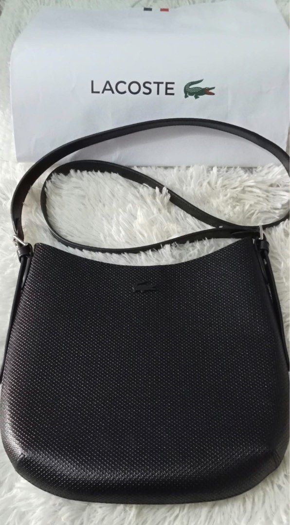 Authentic Lacoste Chantaco Leather Shoulder Bag (Category: Luxury Bags & Wallets) located in Manila. Submitted by prelovedbyjuls17 (Listing ID 1467575254, Image 3). Description: Authentic Lacoste Chantaco Leather Shoulder Bag (Slightly Used / Like New) PRICE: P5,500 DESCRIPTION: Selling my original Lacoste Chantaco Shoulder Bag in classic black. Crafted in signature piqué-textured genuine leather -sleek, structural, and versatile for everyday use