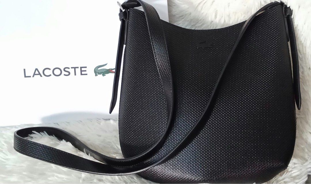 Authentic Lacoste Chantaco Leather Shoulder Bag (Category: Luxury Bags & Wallets) located in Manila. Submitted by prelovedbyjuls17 (Listing ID 1467575254, Image 2). Description: Authentic Lacoste Chantaco Leather Shoulder Bag (Slightly Used / Like New) PRICE: P5,500 DESCRIPTION: Selling my original Lacoste Chantaco Shoulder Bag in classic black. Crafted in signature piqué-textured genuine leather -sleek, structural, and versatile for everyday use
