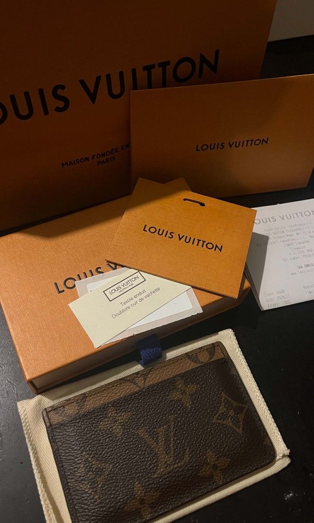 Authentic Louis Vuitton Monogram Reverse Card Holder M69161 (Category: Wallets & Card Holders) located in Taguig. Submitted by art2m (Listing ID 1467556256, Image 2). Description: For Sale: Authentic Louis Vuitton Monogram Reverse Card Holder M69161 Purchased from Louis Vuitton Singapore in August 2021 for SGD 310. Condition: Pre-loved, used - Has lost its original shape from carrying multiple cards. - Black interior material is peeling. - Shows 