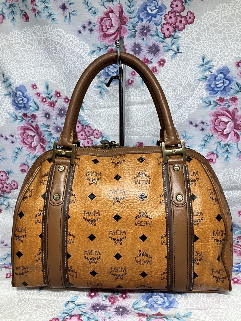 AUTHENTIC MCM VISETOS COGNAC LEATHER TOTE/SHOULDER BAG (Category: Shoulder Bags) located in General Mariano Alvarez. Submitted by adonid (Listing ID 1467390673, Image 3). Description: AUTHENTIC MCM VISETOS COGNAC LEATHER TOTE/SHOULDER BAG GOOD CONDITION NORMAL SIGN OF USAGE ONLY.